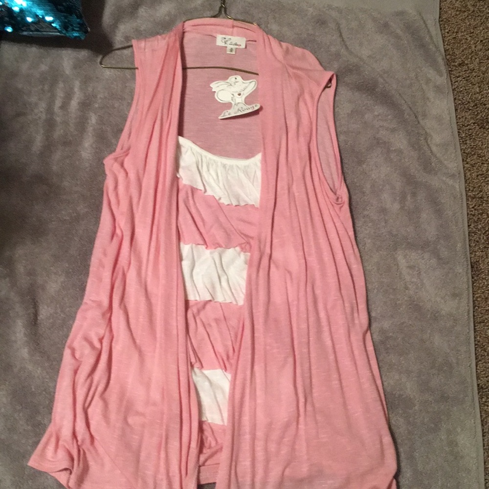 Really cute pink and white shirt.